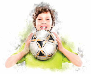 Child holding a soccer ball